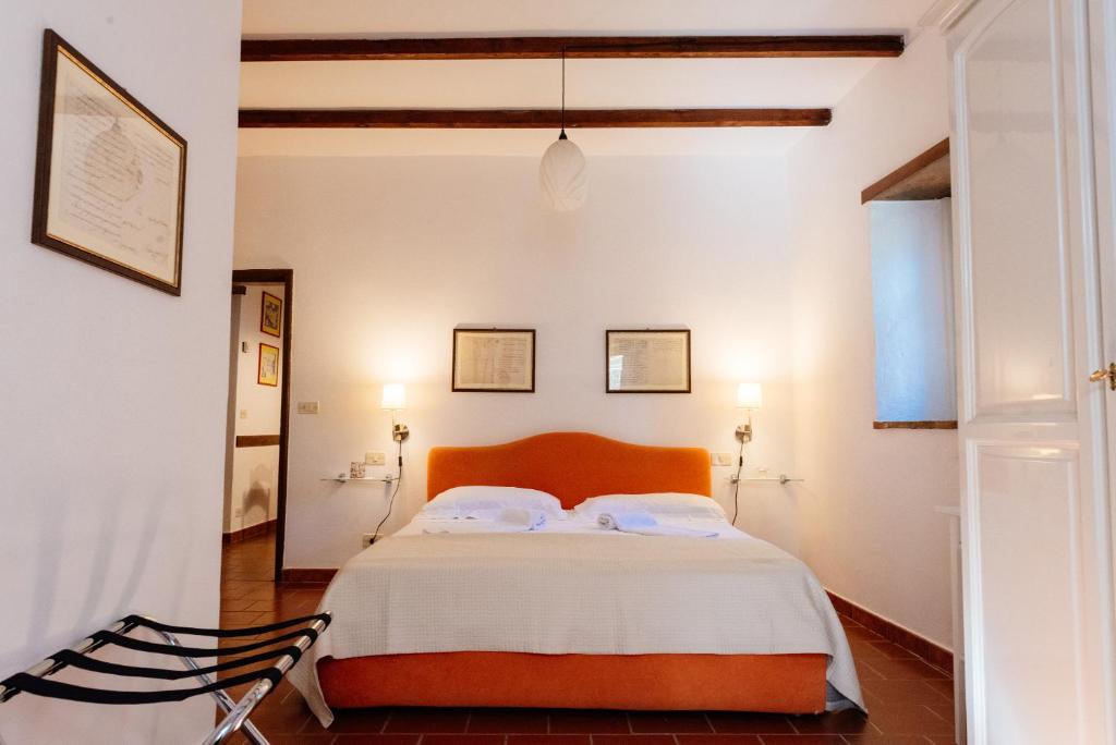 Postel nebo postele na pokoji v ubytování B&B Borgo di Oliveto - Appartamenti con Cucina