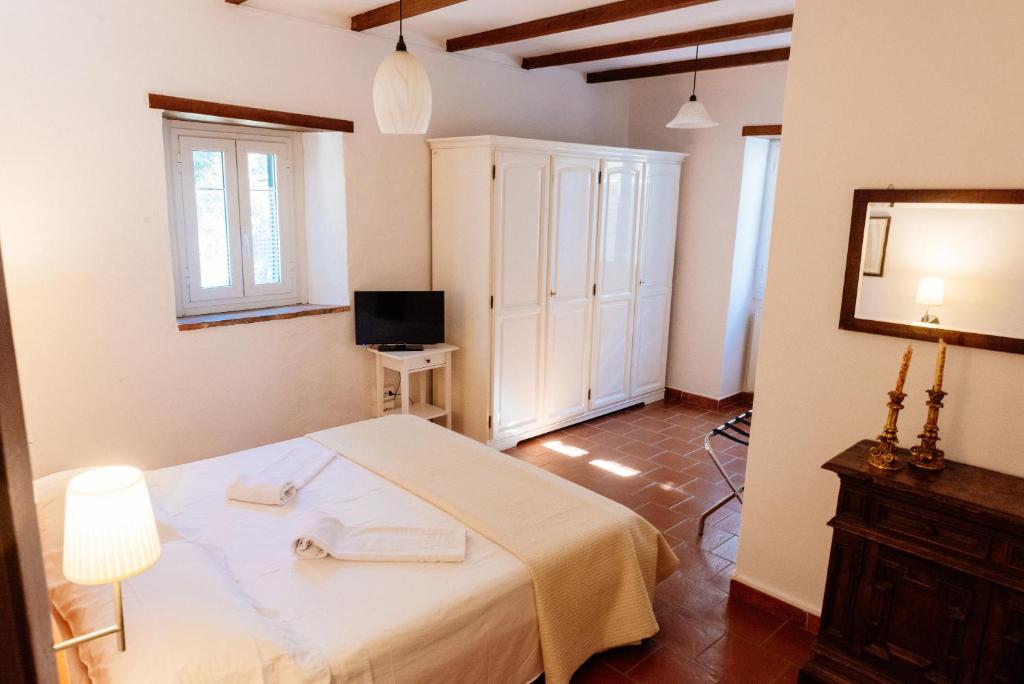 Postel nebo postele na pokoji v ubytování B&B Borgo di Oliveto - Appartamenti con Cucina