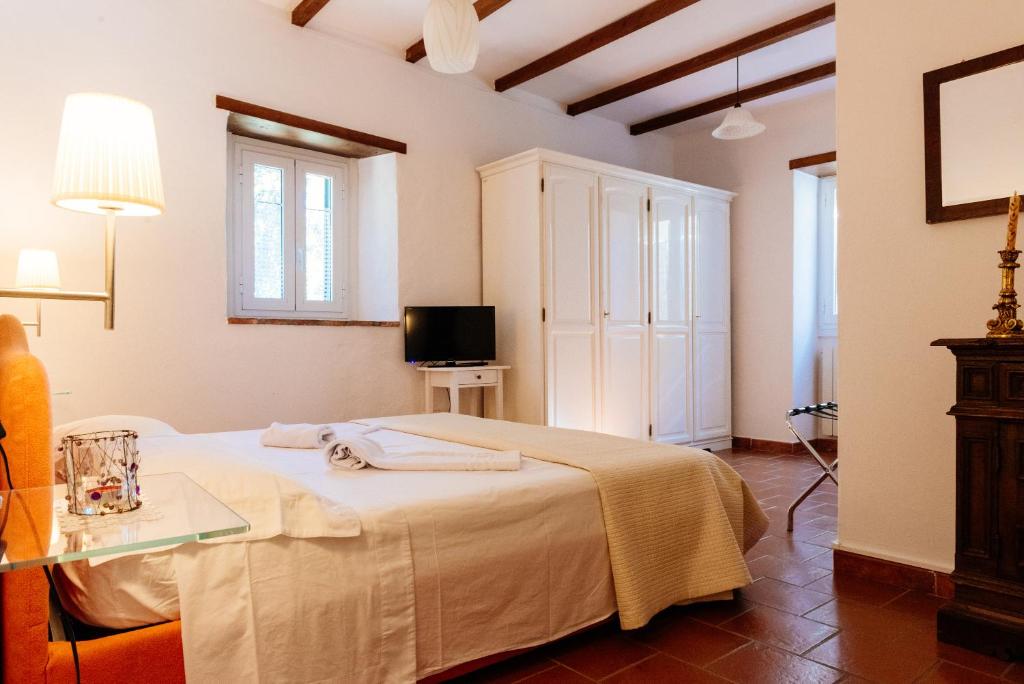 Postel nebo postele na pokoji v ubytování B&B Borgo di Oliveto - Appartamenti con Cucina
