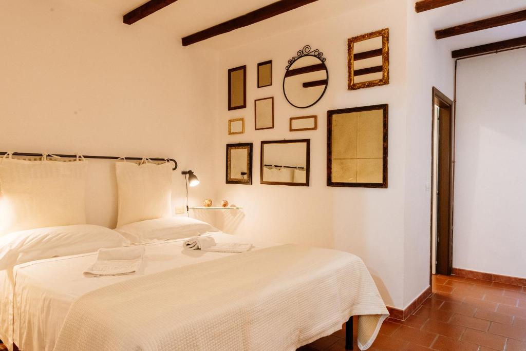 Postel nebo postele na pokoji v ubytování B&B Borgo di Oliveto - Appartamenti con Cucina