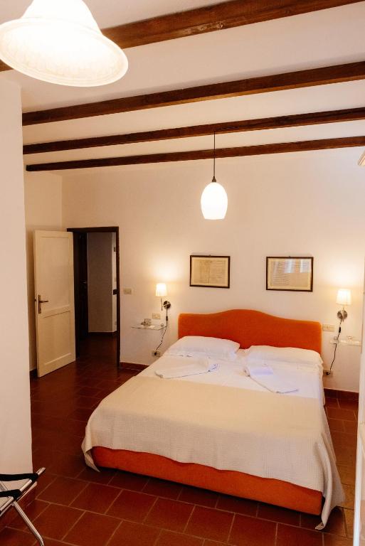 Postel nebo postele na pokoji v ubytování B&B Borgo di Oliveto - Appartamenti con Cucina
