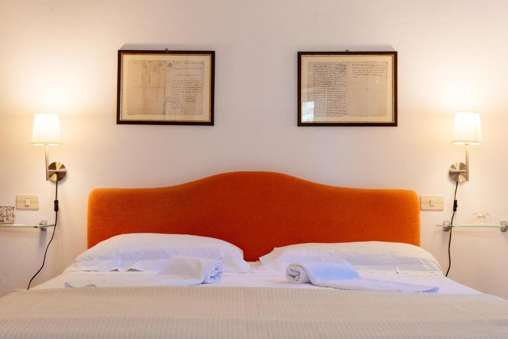 Postel nebo postele na pokoji v ubytování B&B Borgo di Oliveto - Appartamenti con Cucina