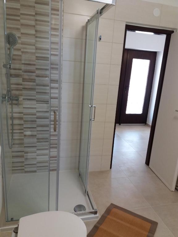Łazienka w obiekcie House Mergi 2
