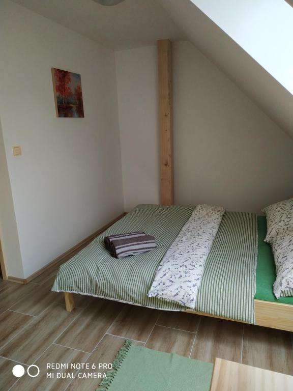Postel nebo postele na pokoji v ubytování Ubytovani Ve stodole
