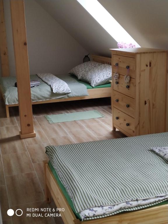 Postel nebo postele na pokoji v ubytování Ubytovani Ve stodole