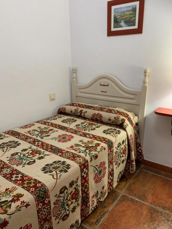Postel nebo postele na pokoji v ubytování Hostal Atalaya en Capileira CB