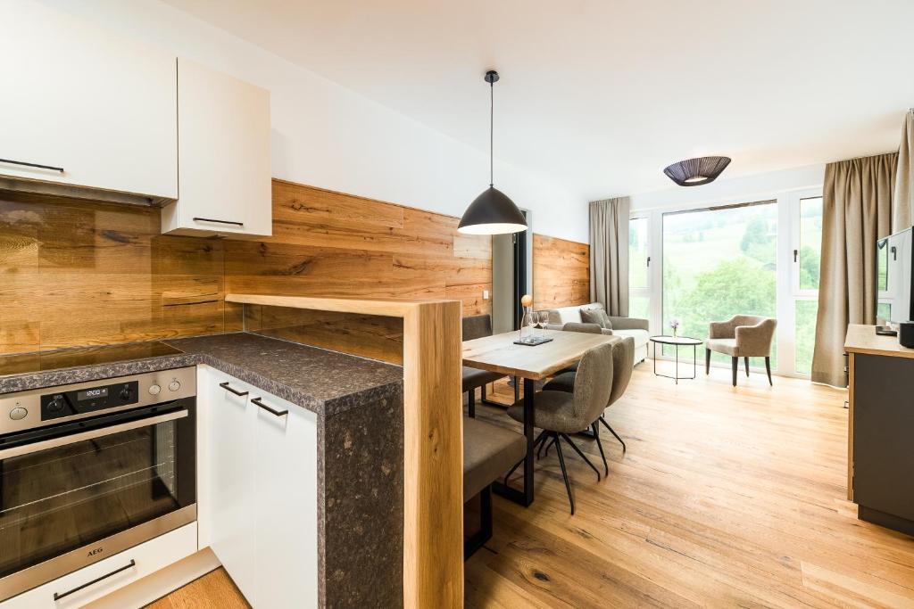 Kuchyň nebo kuchyňský kout v ubytování Apartmenthotel Sonnenhof
