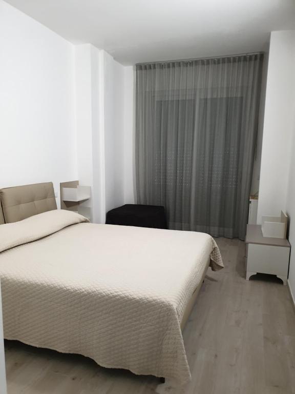 Postel nebo postele na pokoji v ubytování Iris home