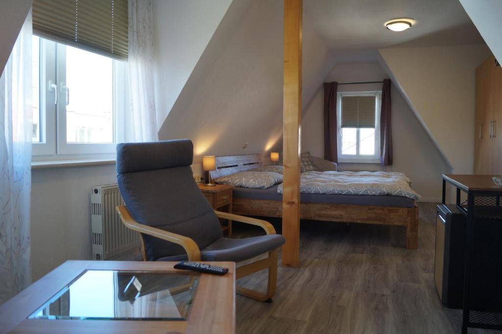 Postel nebo postele na pokoji v ubytování Hotel Villa Undine