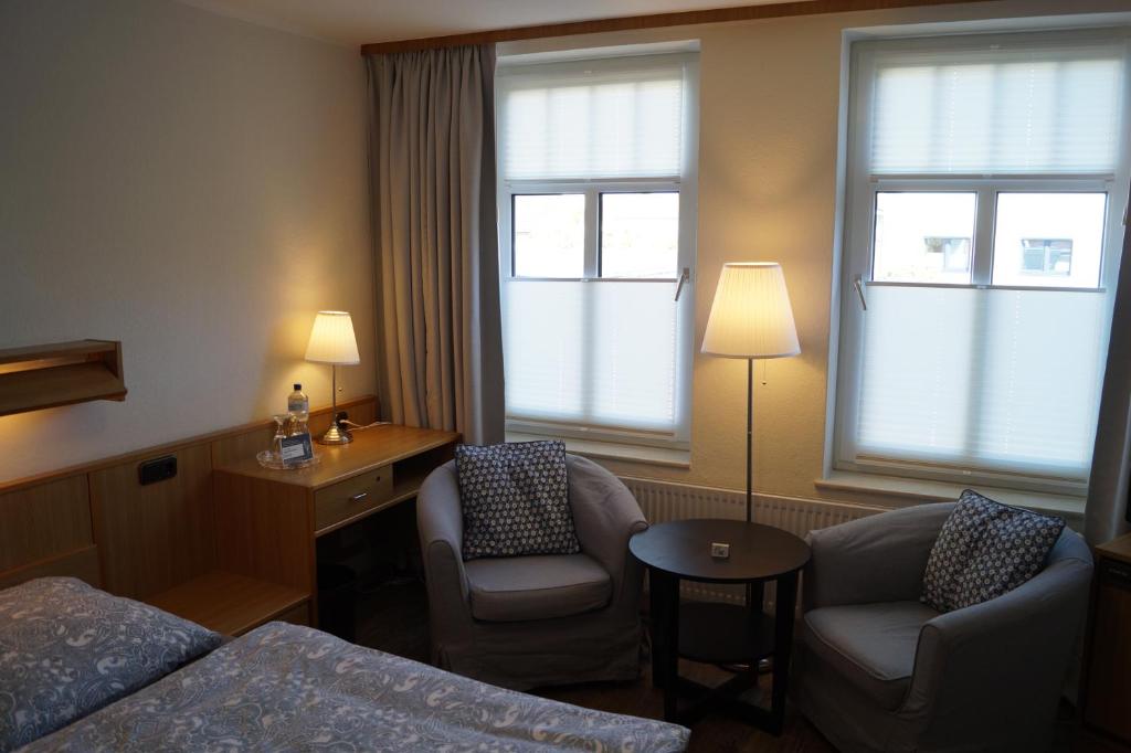 Postel nebo postele na pokoji v ubytování Hotel Villa Undine
