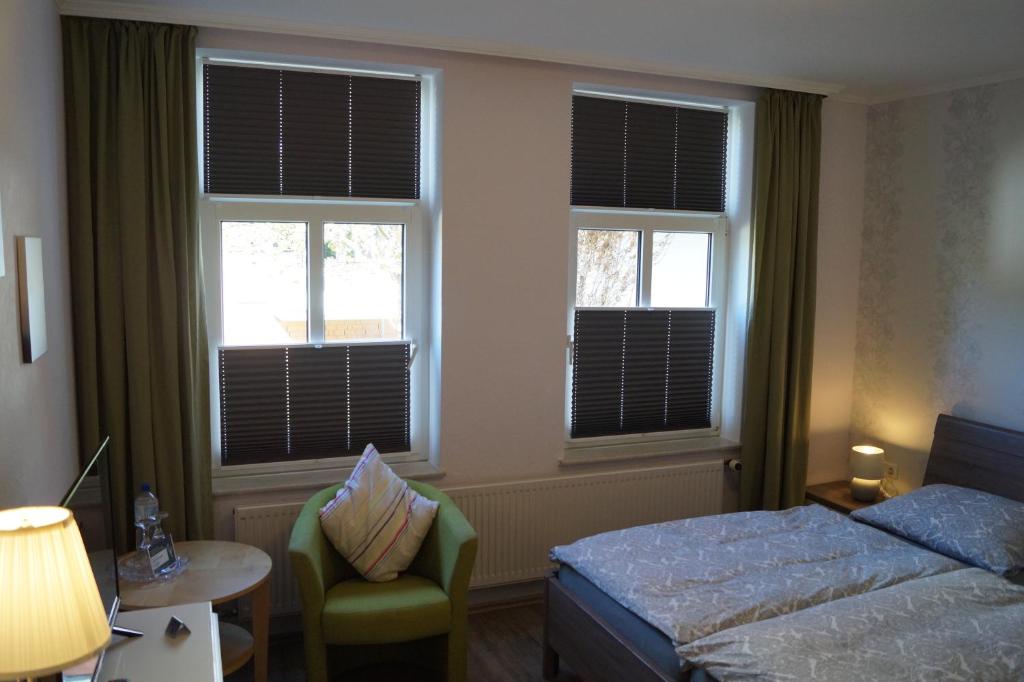 Postel nebo postele na pokoji v ubytování Hotel Villa Undine