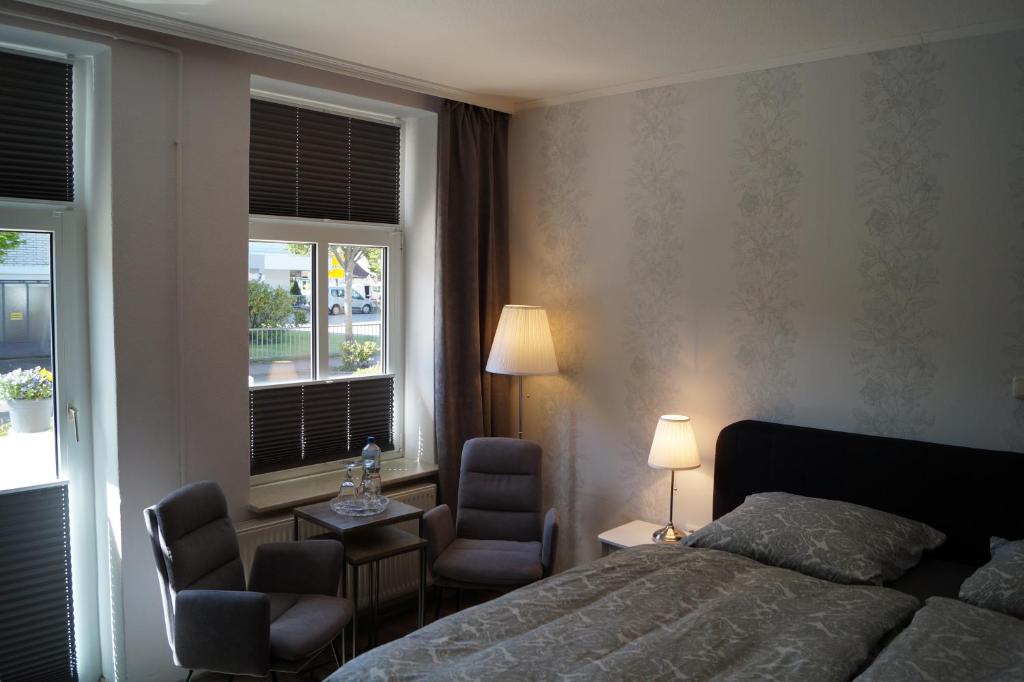 Postel nebo postele na pokoji v ubytování Hotel Villa Undine
