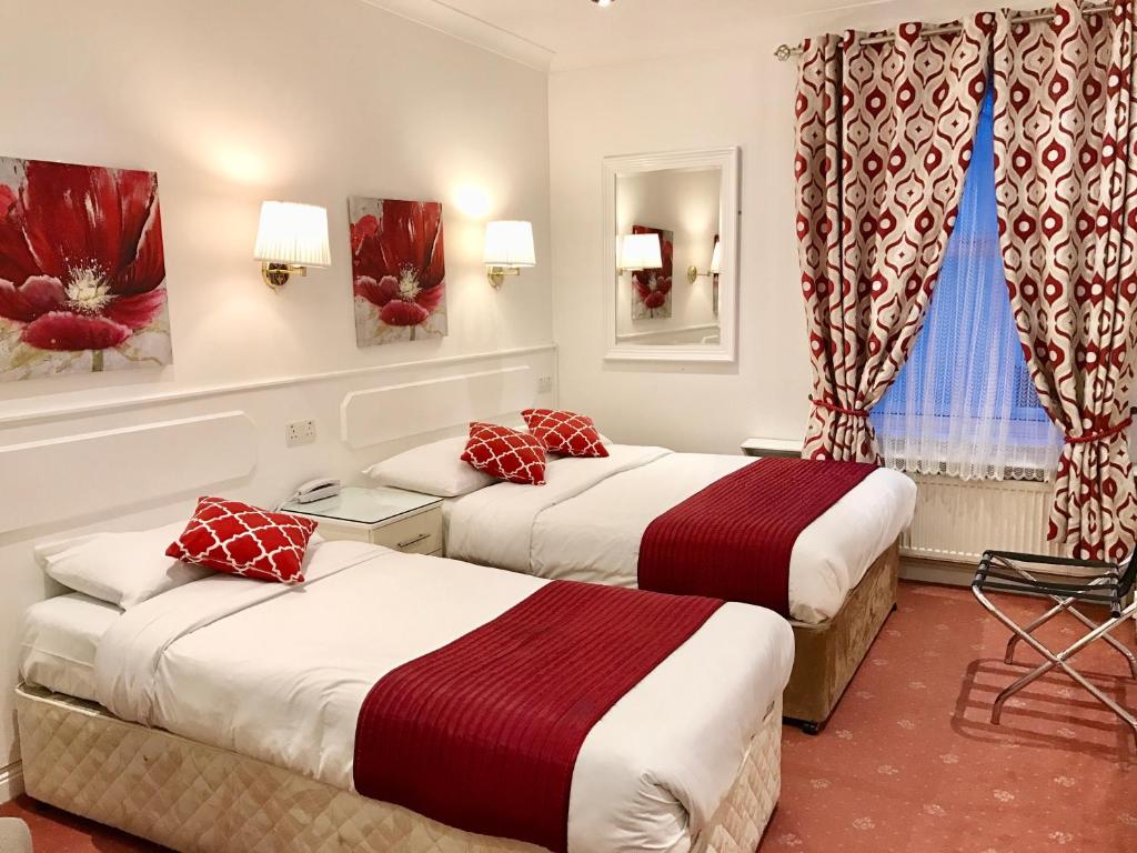 Krevet ili kreveti u jedinici u okviru objekta Dergvale Hotel