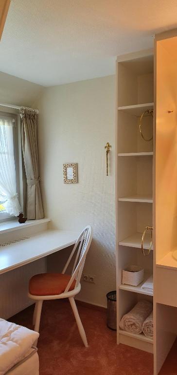 Postel nebo postele na pokoji v ubytování Haus Caluschi