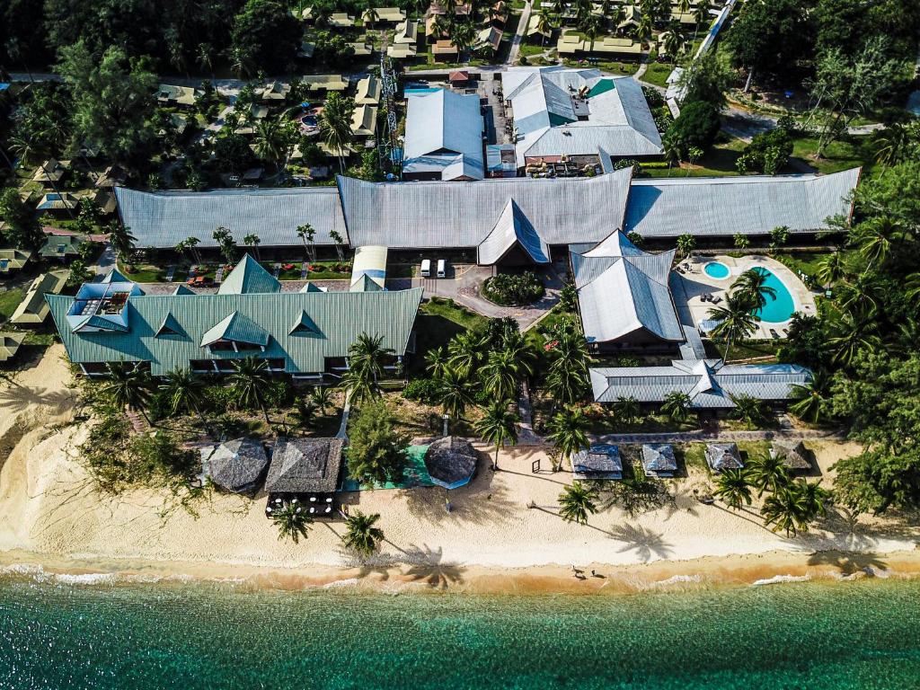 an aerial view of a resort on the beach at Berjaya Tioman Resort in Tioman Island