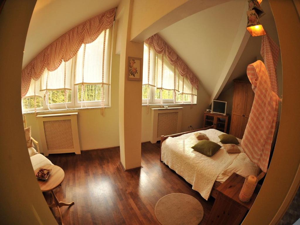 Postel nebo postele na pokoji v ubytování Guesthouse Trajbar Team