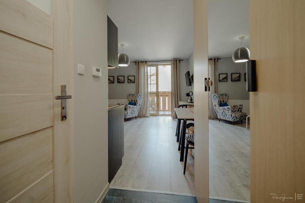 Kuchyňa alebo kuchynka v ubytovaní Apartamenty Silence Górskie Zacisze