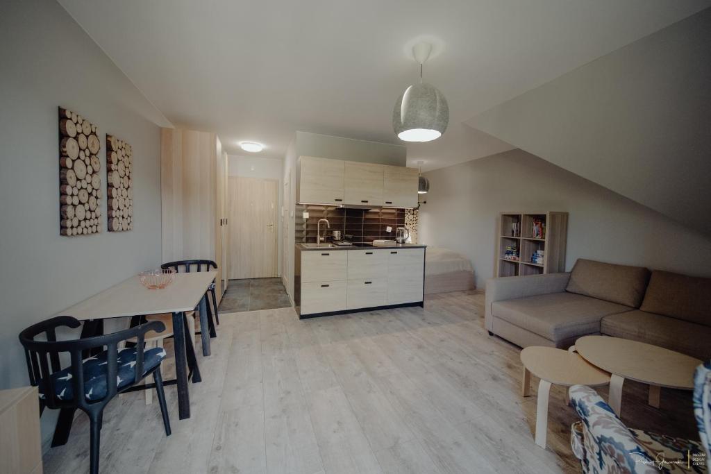 Kuchyňa alebo kuchynka v ubytovaní Apartamenty Silence Górskie Zacisze