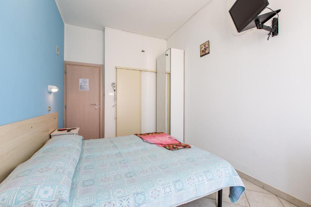 Postel nebo postele na pokoji v ubytování Hotel Sant'Angelo