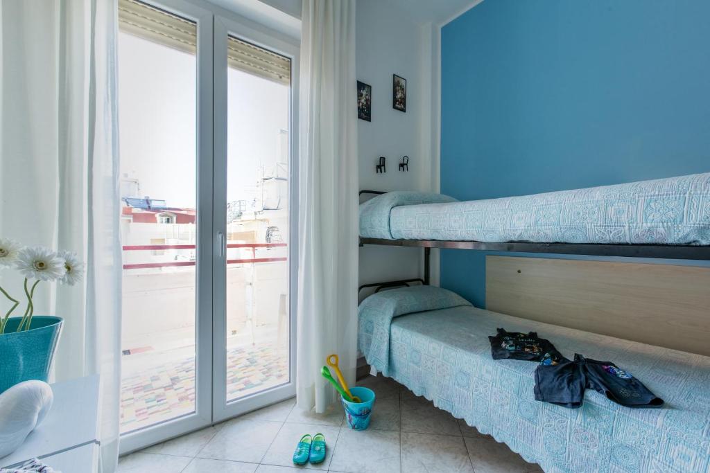 Postel nebo postele na pokoji v ubytování Hotel Sant'Angelo