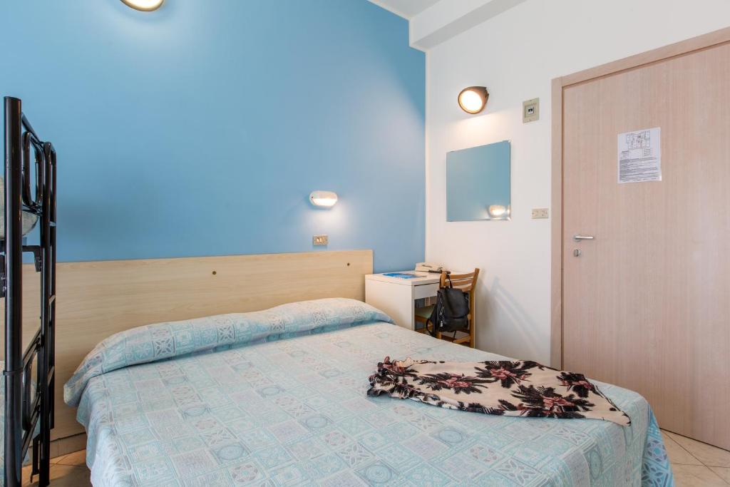 Postel nebo postele na pokoji v ubytování Hotel Sant'Angelo