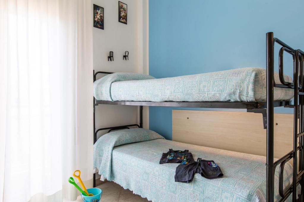 Postel nebo postele na pokoji v ubytování Hotel Sant'Angelo