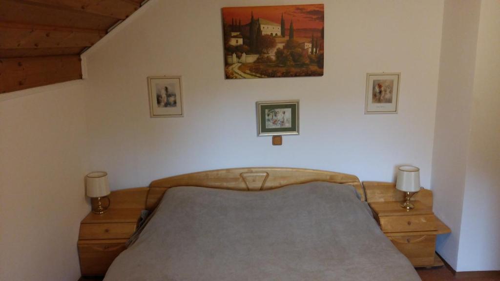 Postel nebo postele na pokoji v ubytování Georges Rast
