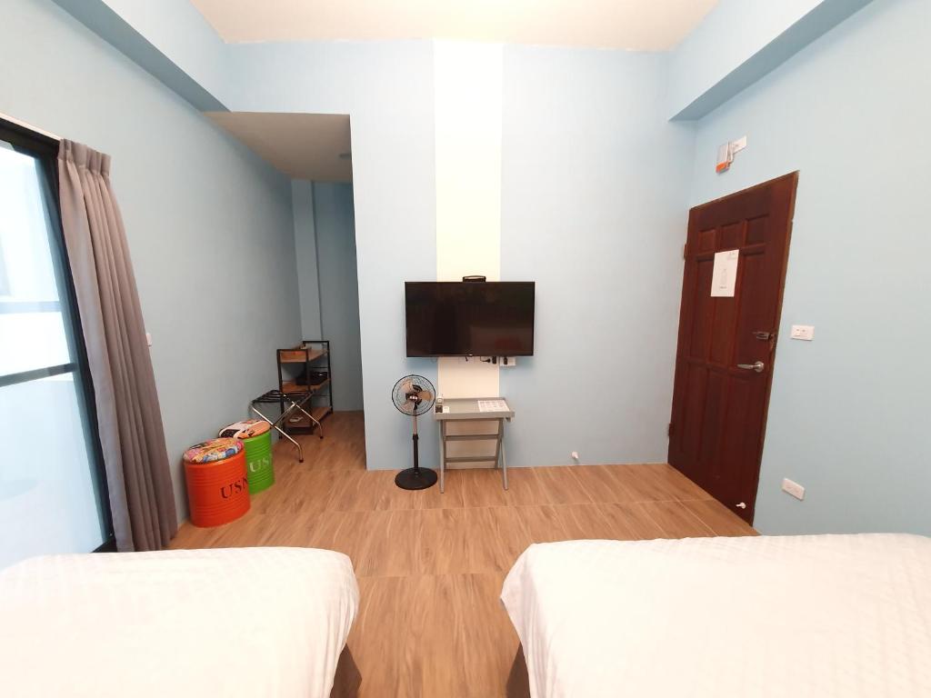 Postel nebo postele na pokoji v ubytování MOYA Homestay