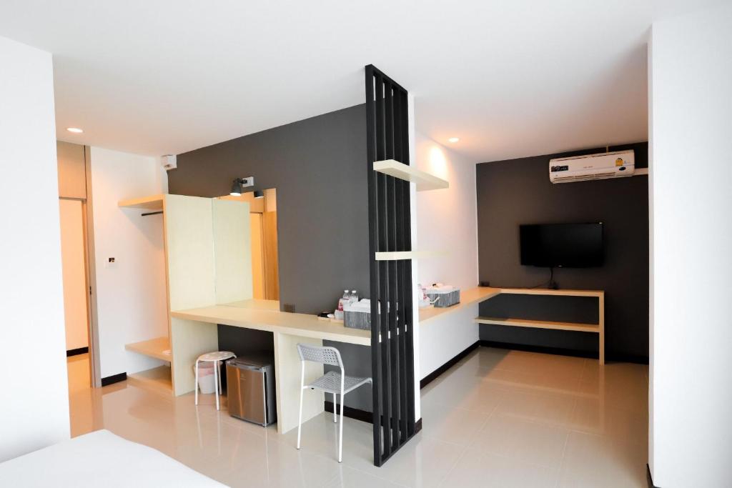 Kuchyň nebo kuchyňský kout v ubytování The Rest Hotel - ประจวบ