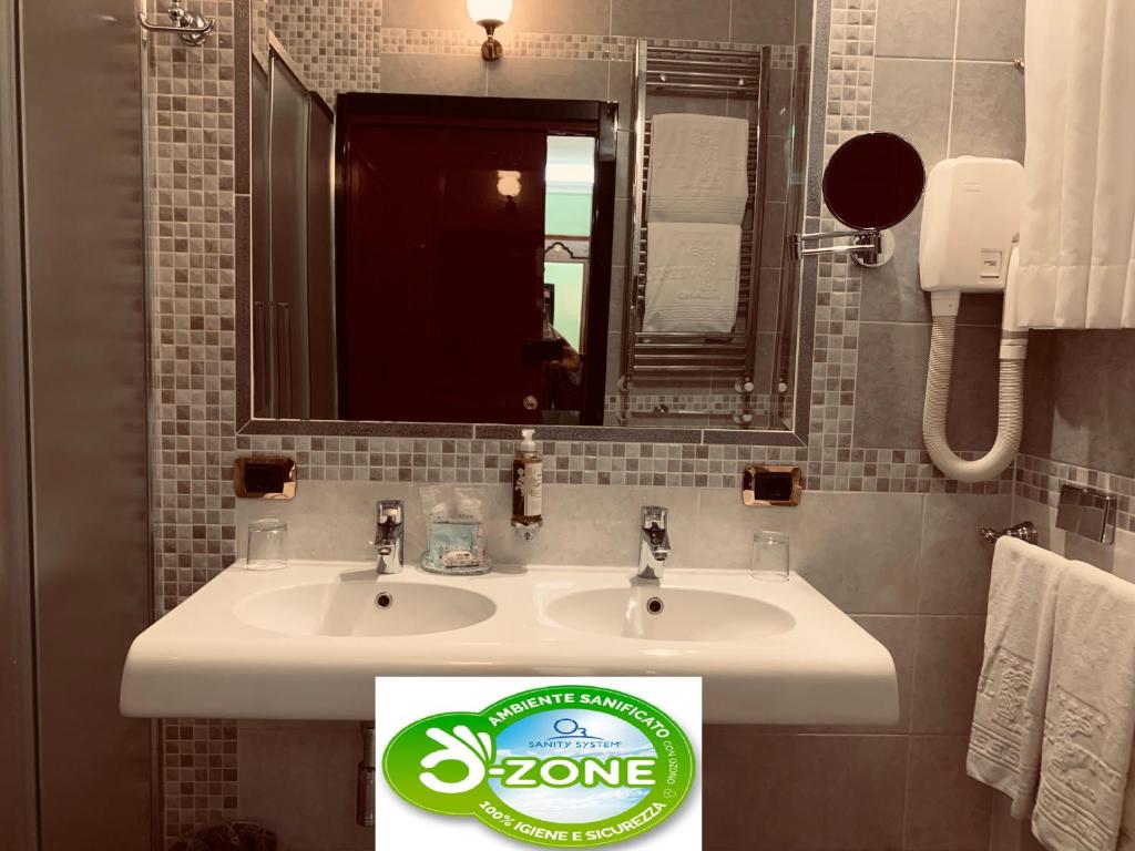 Koupelna v ubytování Hotel Vittoria
