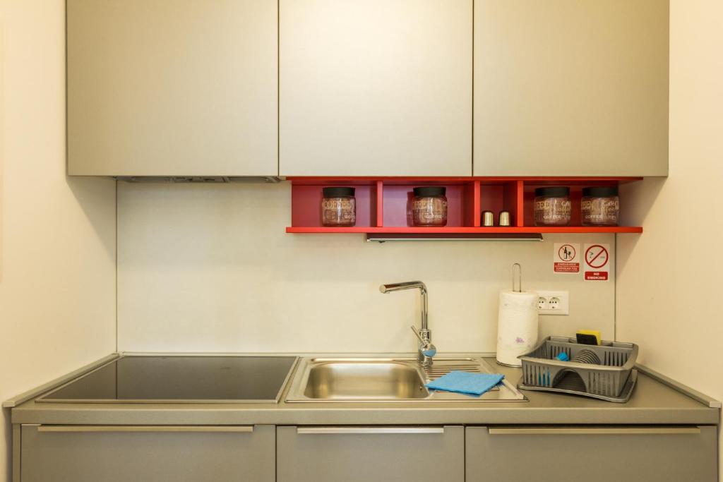 Kuchyň nebo kuchyňský kout v ubytování Aparthotel Gimi
