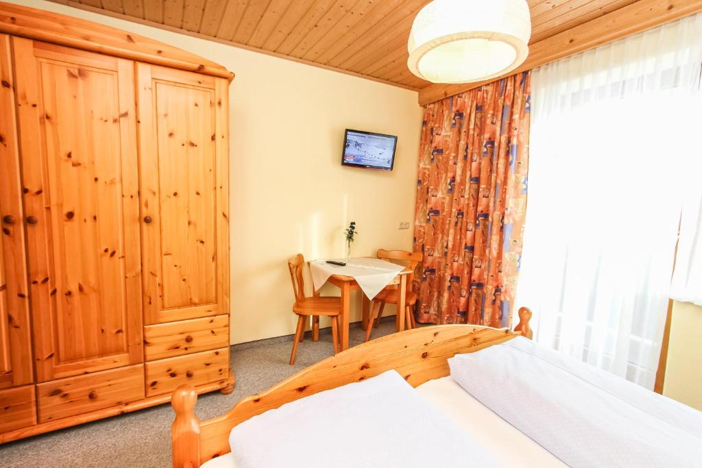 Postel nebo postele na pokoji v ubytování Schneiderbauer