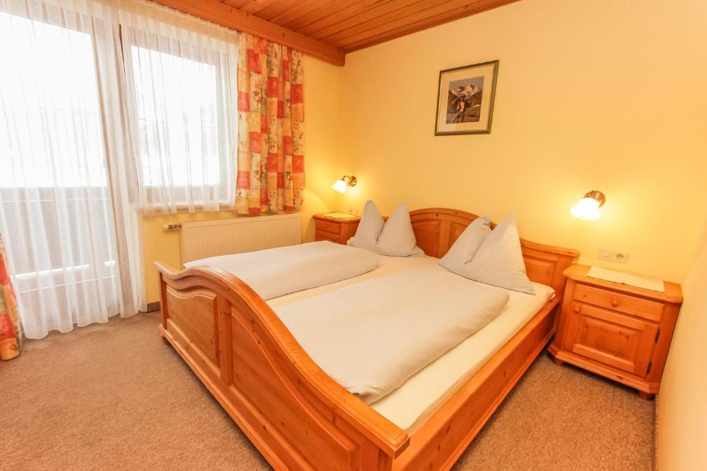 Postel nebo postele na pokoji v ubytování Schneiderbauer