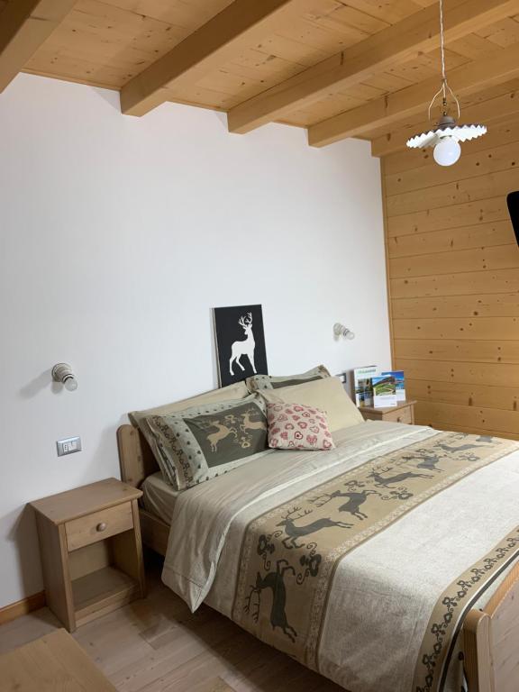 Łóżko lub łóżka w pokoju w obiekcie Locanda "Al Terrazzo"
