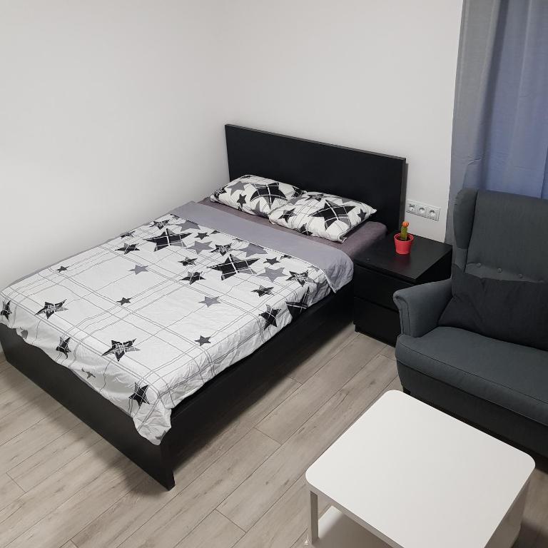 Posteľ alebo postele v izbe v ubytovaní MirrorRoom PL Downtown