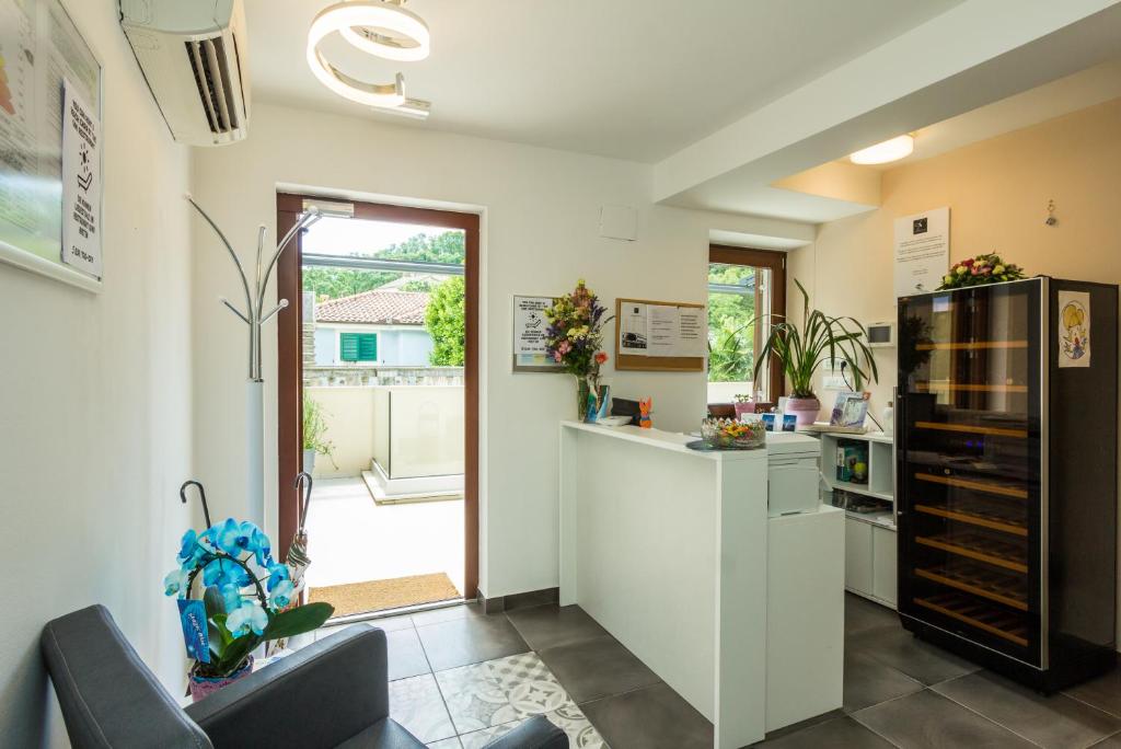 Kuchyň nebo kuchyňský kout v ubytování Aparthotel Gimi