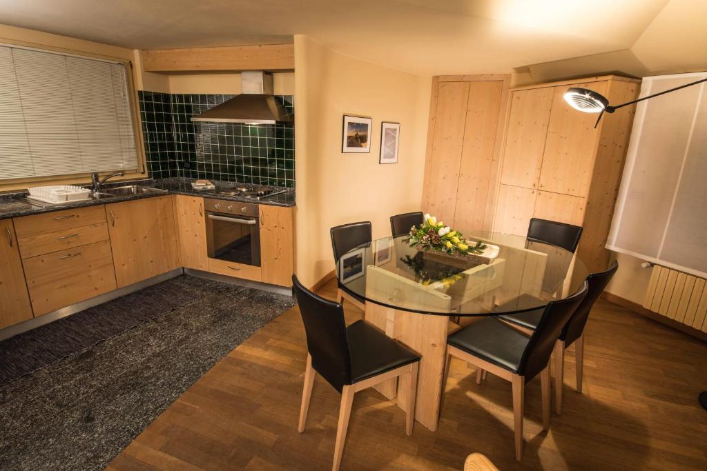 Kuchyň nebo kuchyňský kout v ubytování Appartamenti Pirovano Bormio