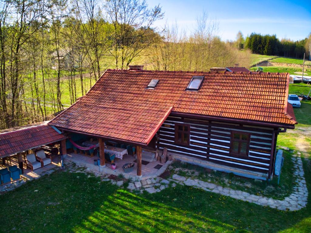an overhead view of a house with a red roof at Gospodarstwo Agroturystyczne "Paryja" in Ołpiny