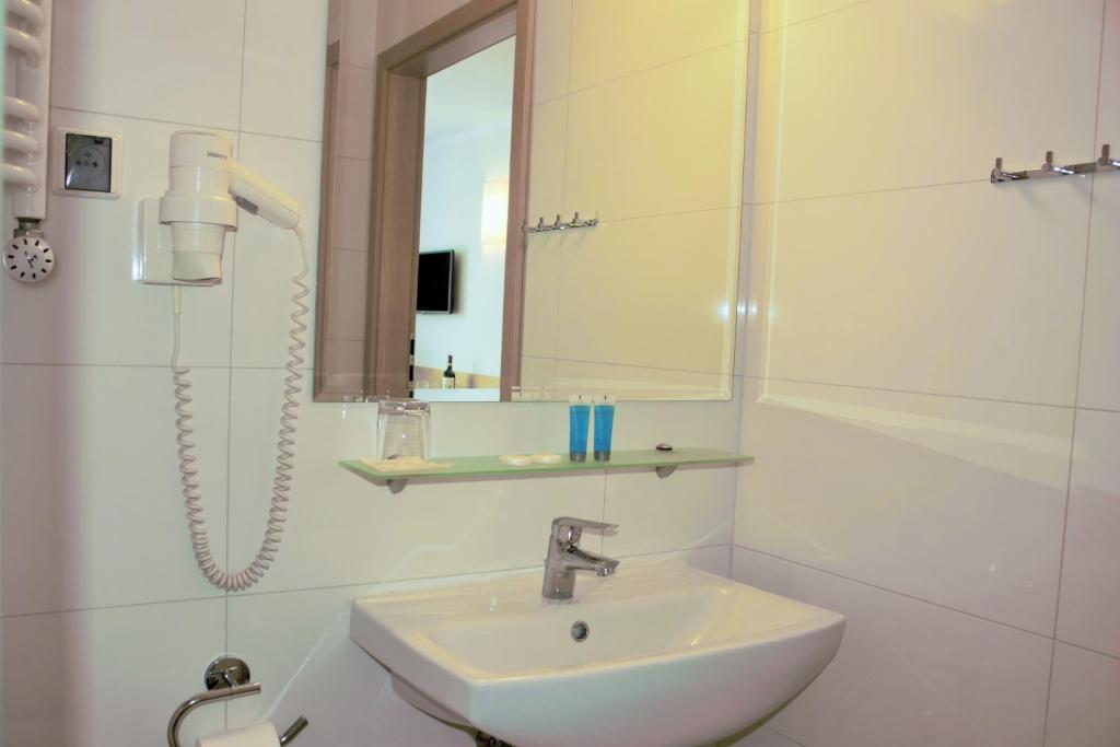 Kúpeľňa v ubytovaní Hotel Huszcza