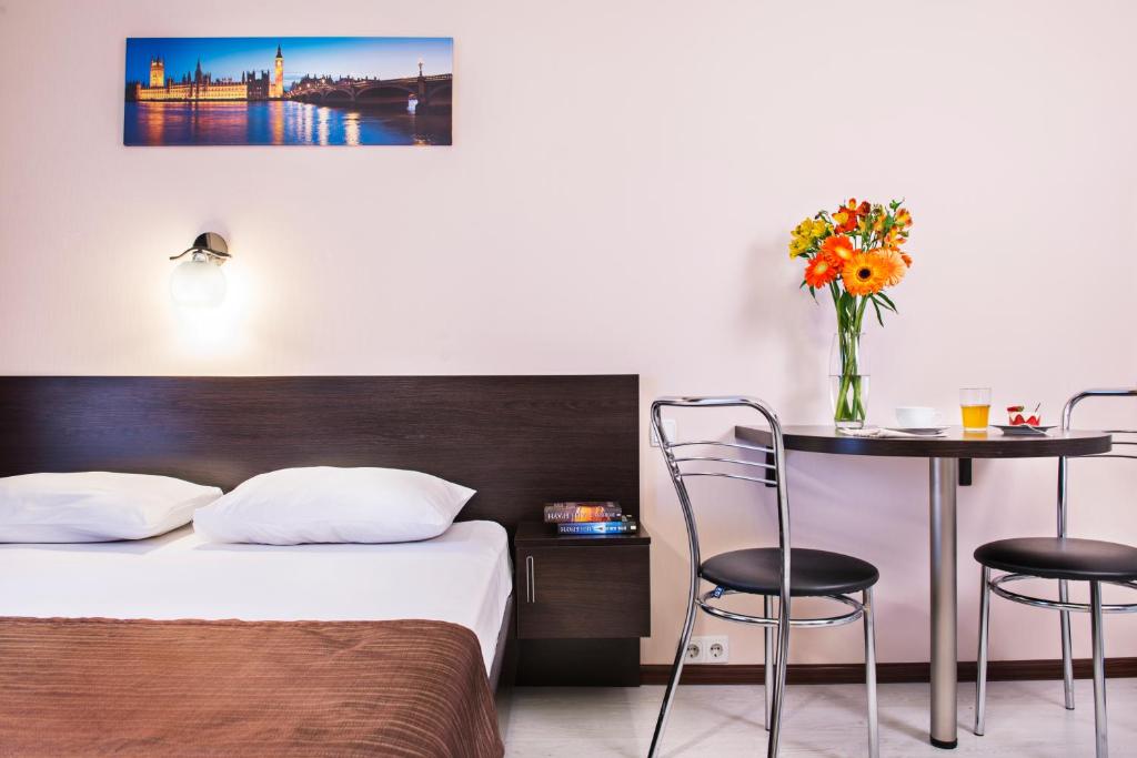 Status Apartments - 