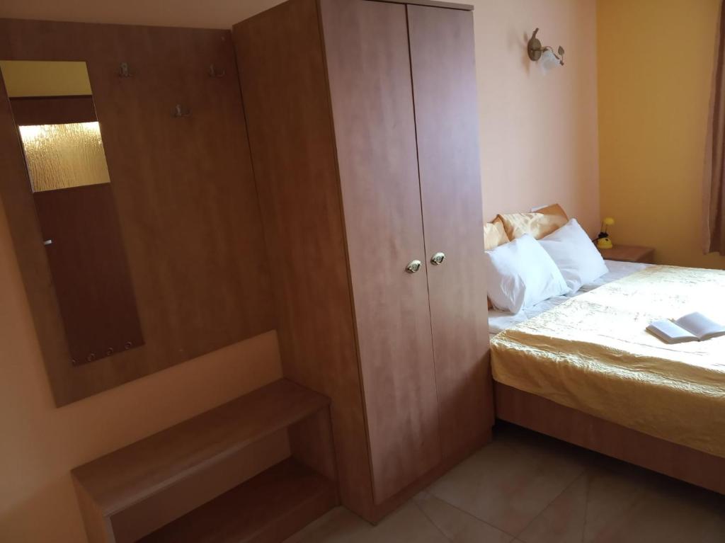 Postel nebo postele na pokoji v ubytování Willa ANNA