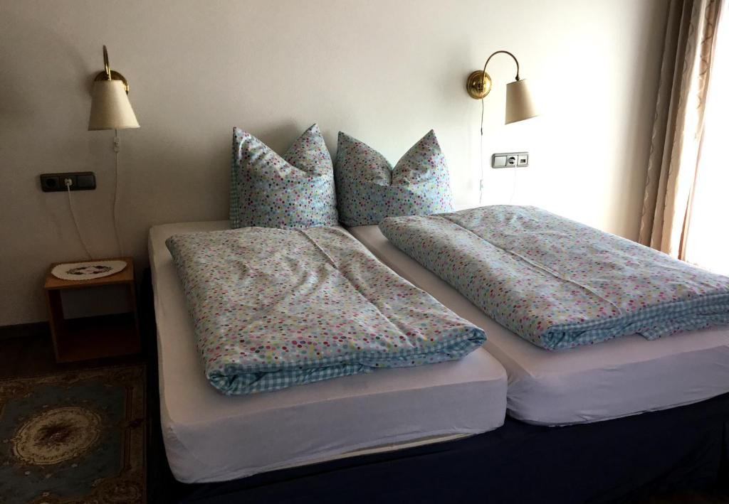 Postel nebo postele na pokoji v ubytování Ferienwohnung Birkentalblick