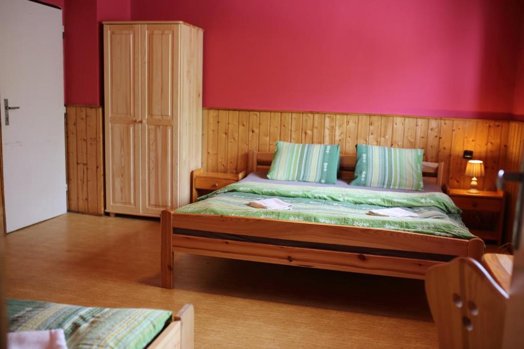 Postel nebo postele na pokoji v ubytování Chata Orlí vrch