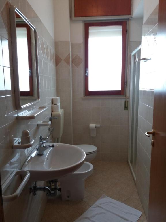 Koupelna v ubytování Hotel Rugantino
