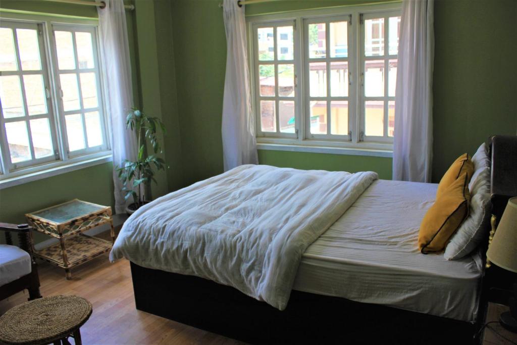 Postel nebo postele na pokoji v ubytování KAJI HOME