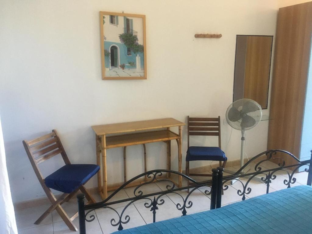 Postel nebo postele na pokoji v ubytování Garden Rooms