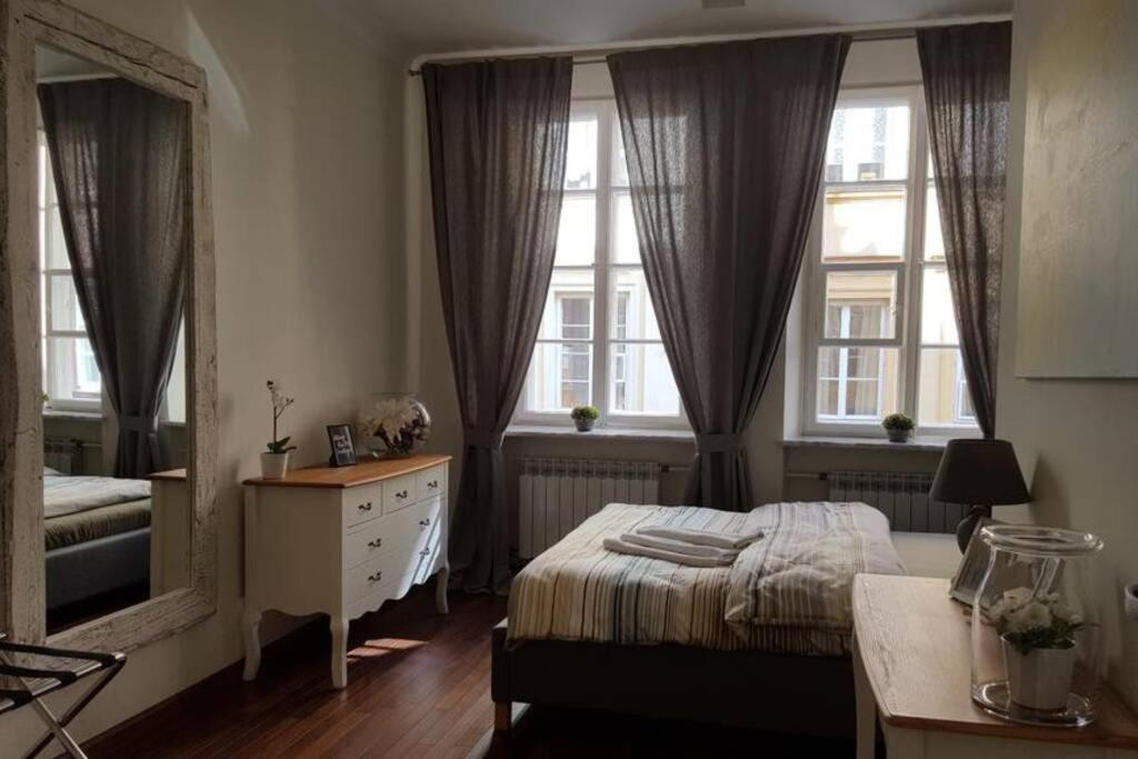 Posteľ alebo postele v izbe v ubytovaní Apartamenty-MI Happy