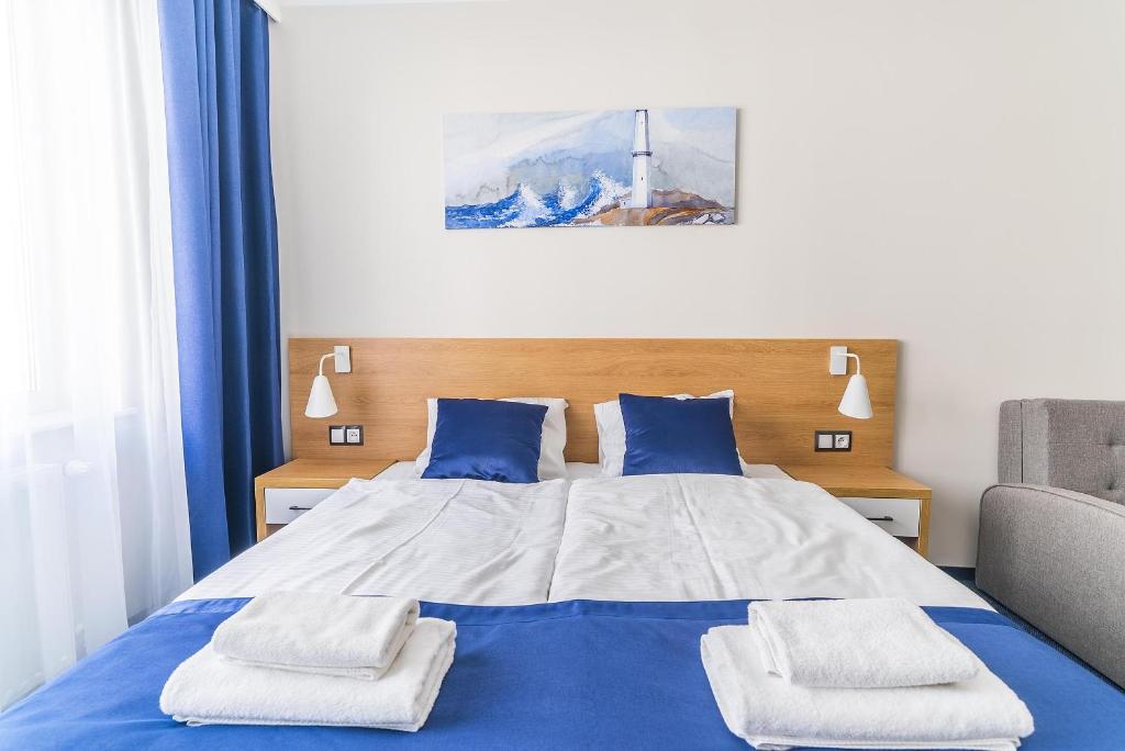 Postel nebo postele na pokoji v ubytování Navii