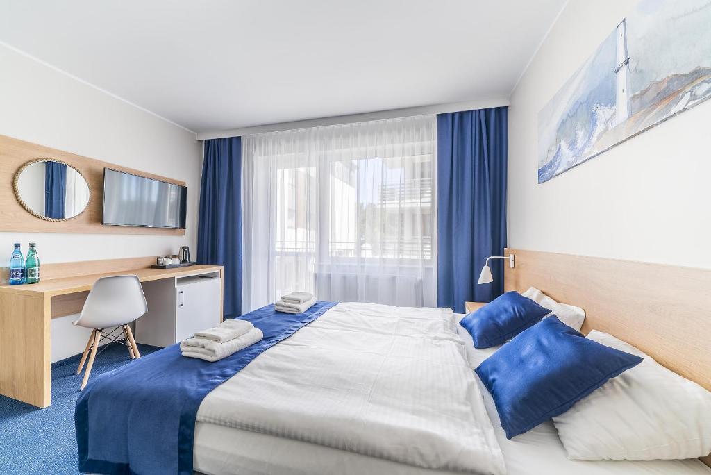 Postel nebo postele na pokoji v ubytování Navii