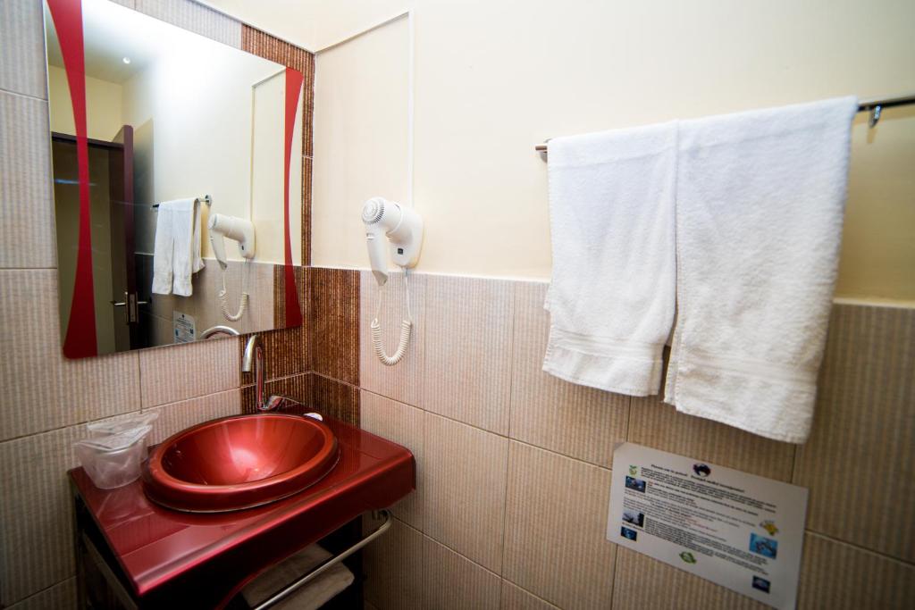 Koupelna v ubytování Hotel Corina